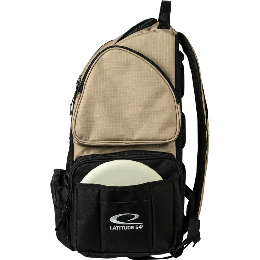 Latitude 64 DG Luxury E5 backpack in Sand/Black, side view with disc in pocket
